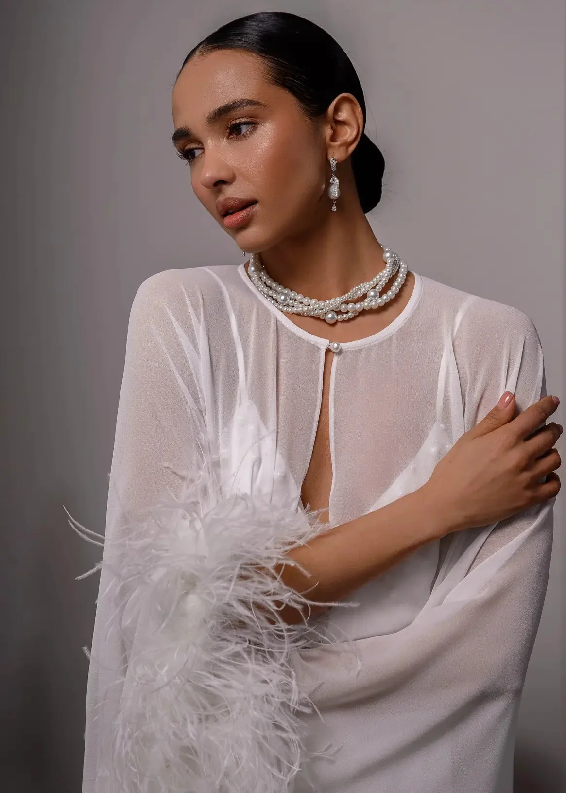 LUMIÈRE long cape with natural feathers