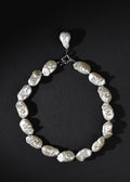 Pearl necklace on a black background